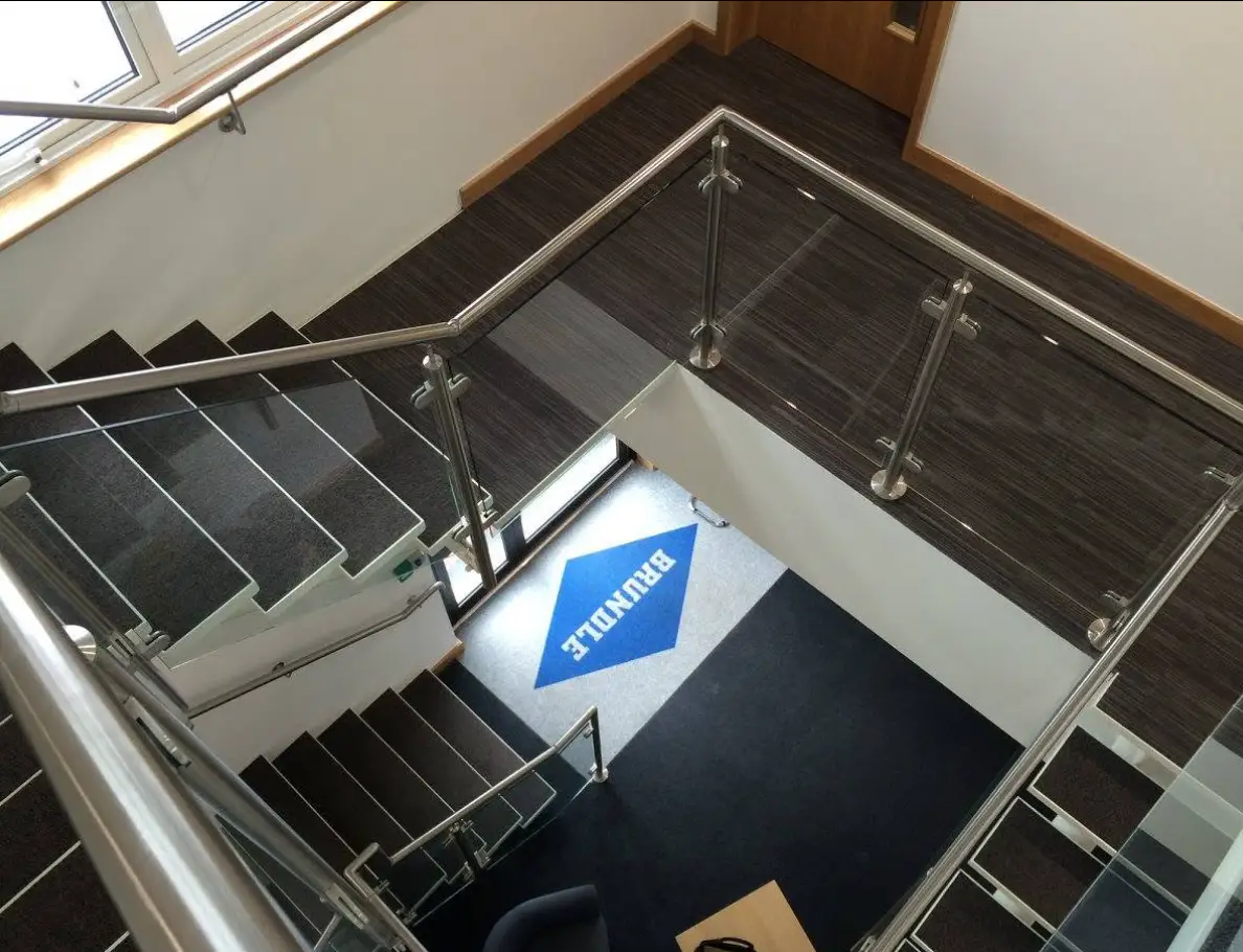 Staircase and modern workspace lighting at Bramble office